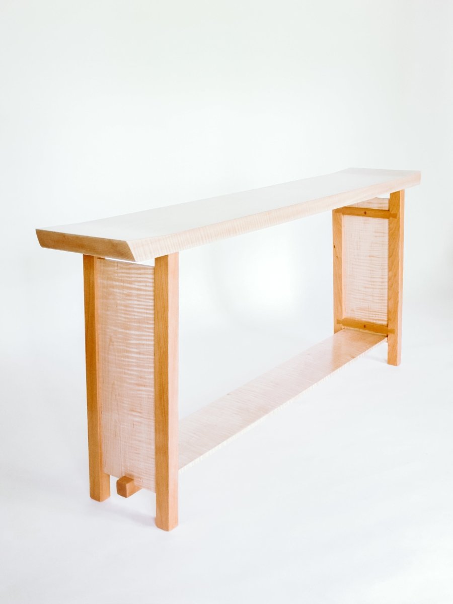 a narrow console table with shelf in tiger maple with cherry legs.  a narrow table for behind the sofa, console for entryway decorating - modern wood furniture designs by Mokuzai Furniture