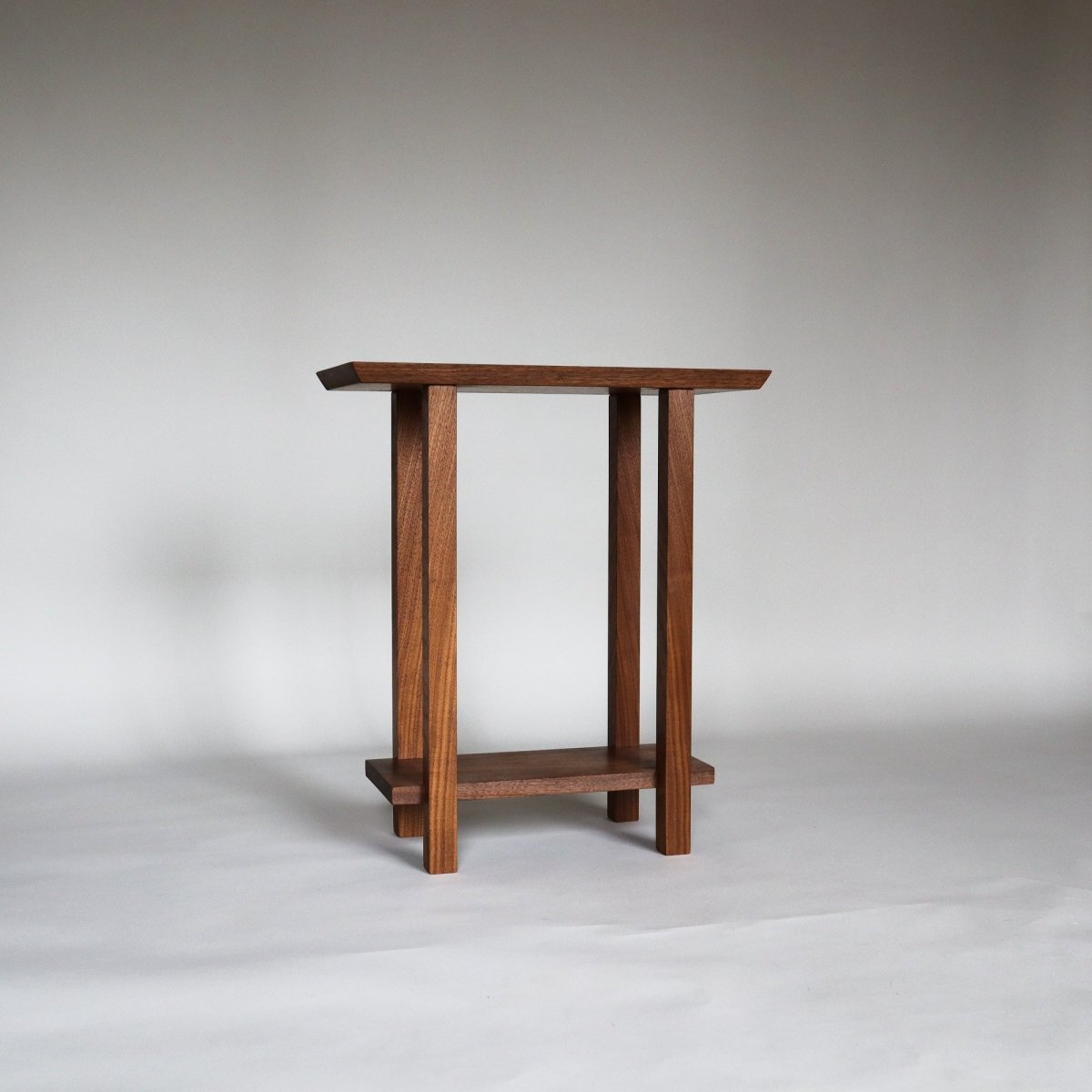 minimalist end table in solid walnut by Mokuzai Furniture