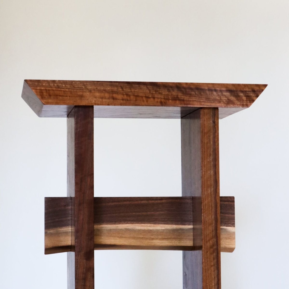 a walnut entry table with a live edge table stretcher for small entryways by Mokuzai Furniture