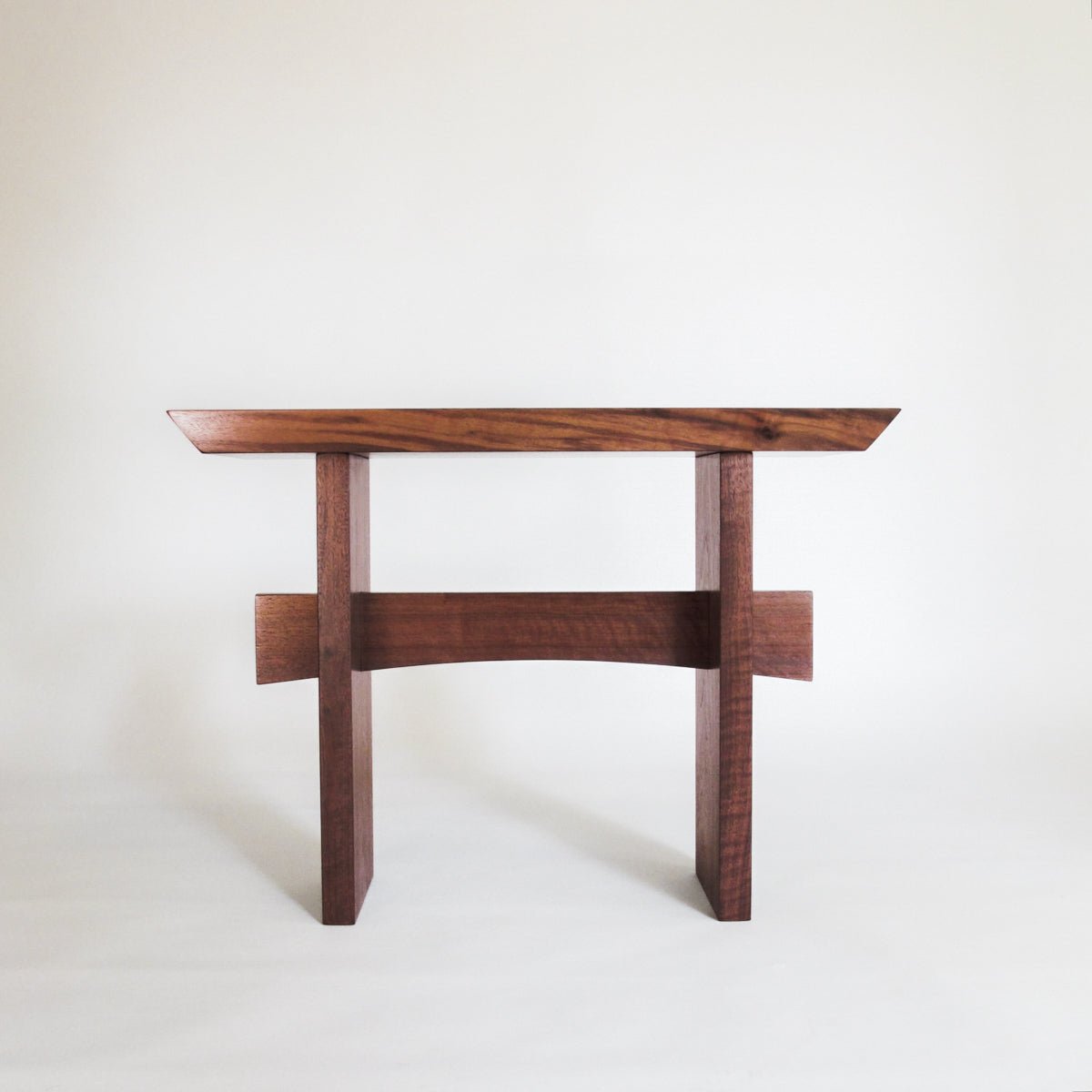 zen style walnut bench for entryways by Mokuzai Furniture